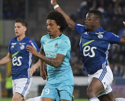 马赛欧冠征途：逆风中绽放的蓝色火焰